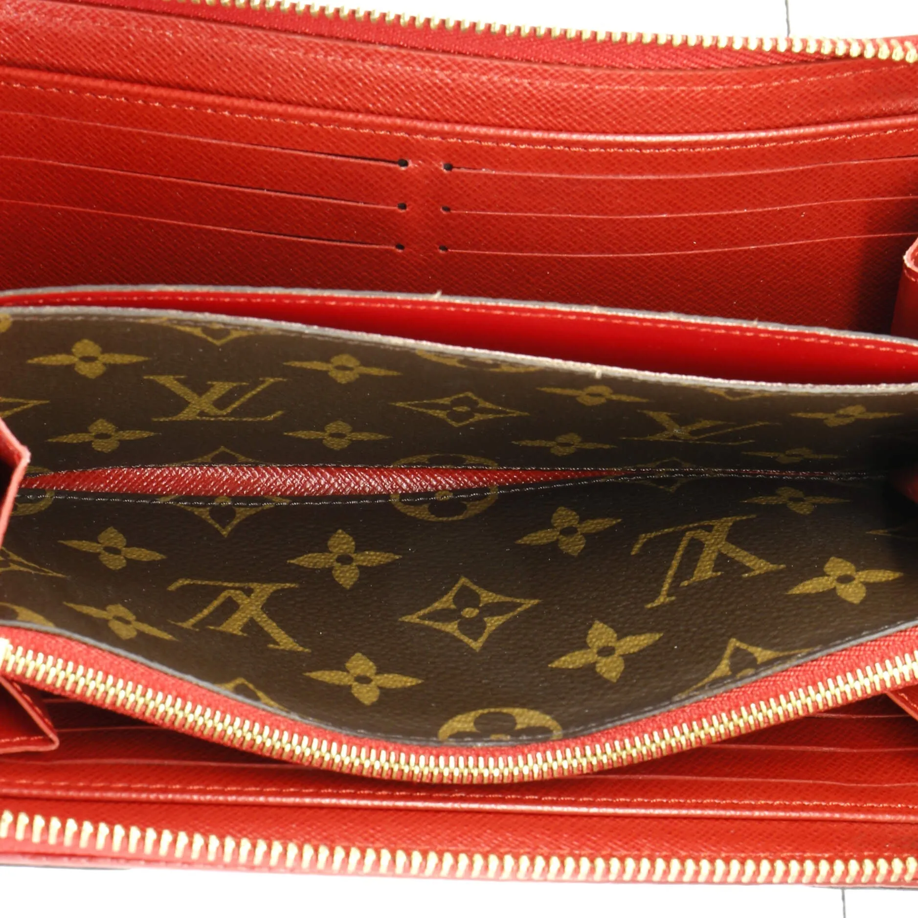 Designer Retiro Zippy Wallet Monogram Canvas