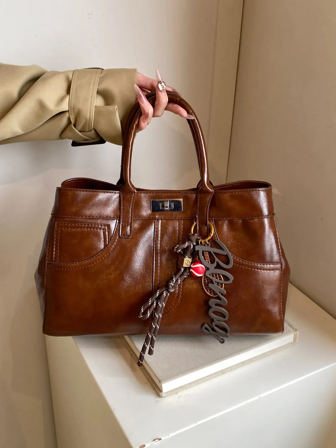 Luxe Charm PU Leather Handbag – With Signature Pendant