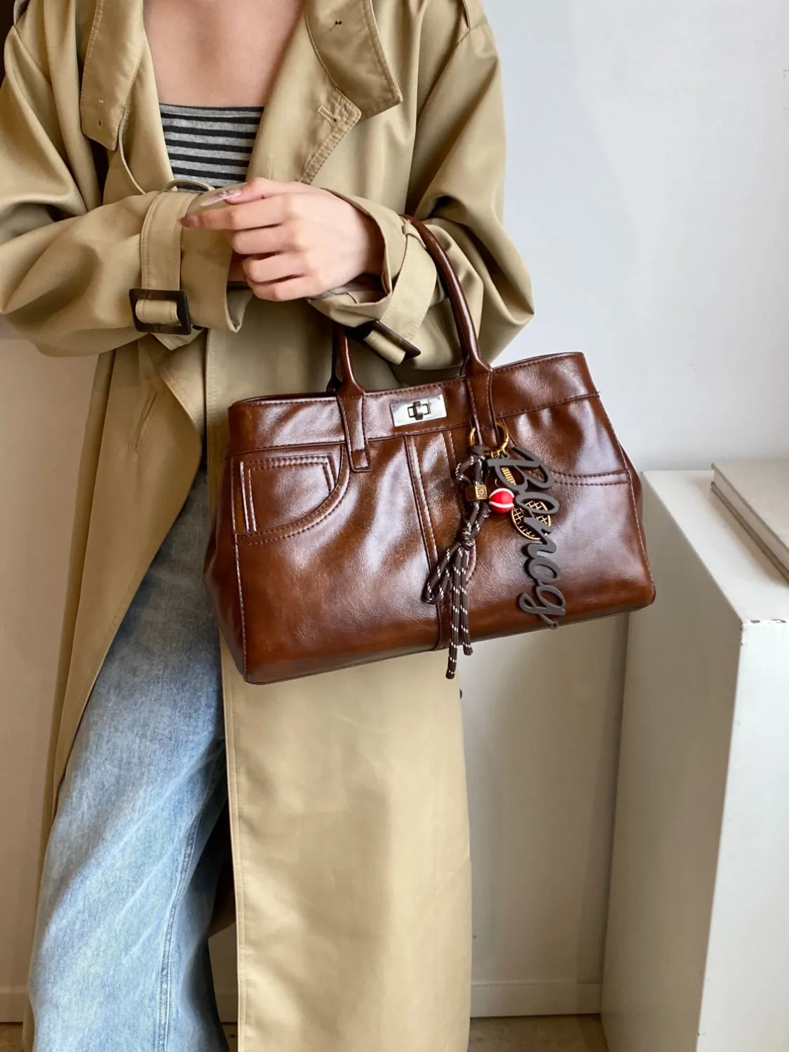 Luxe Charm PU Leather Handbag – With Signature Pendant