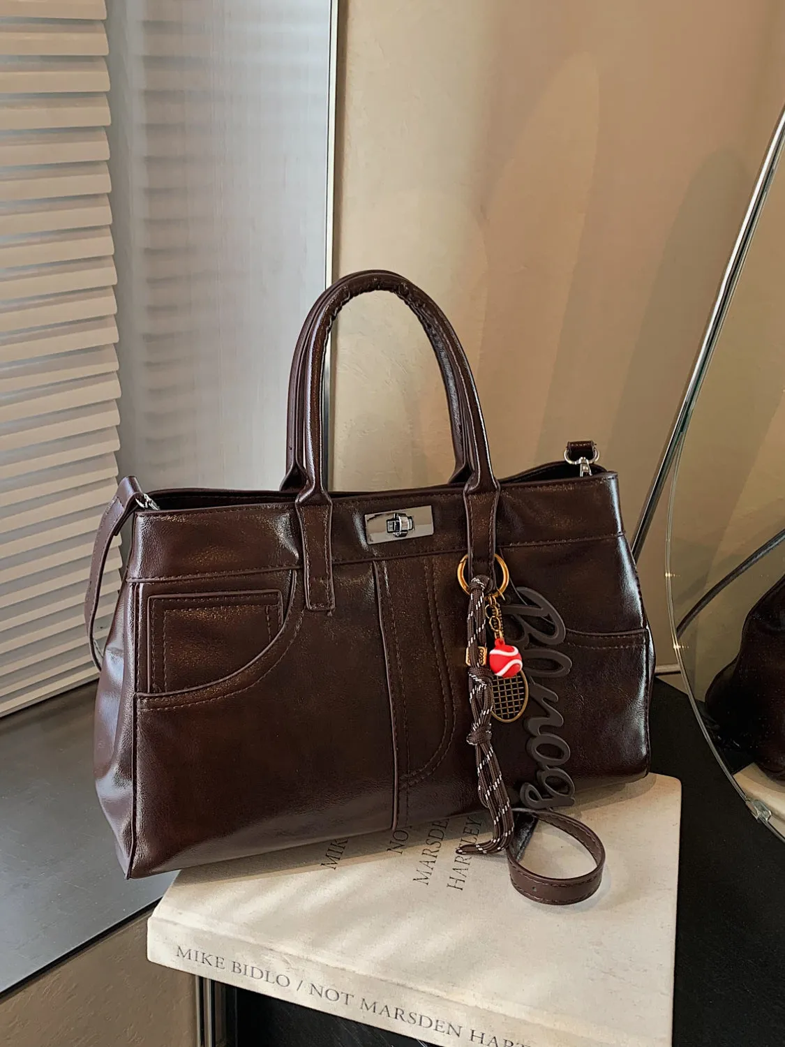 Luxe Charm PU Leather Handbag – With Signature Pendant