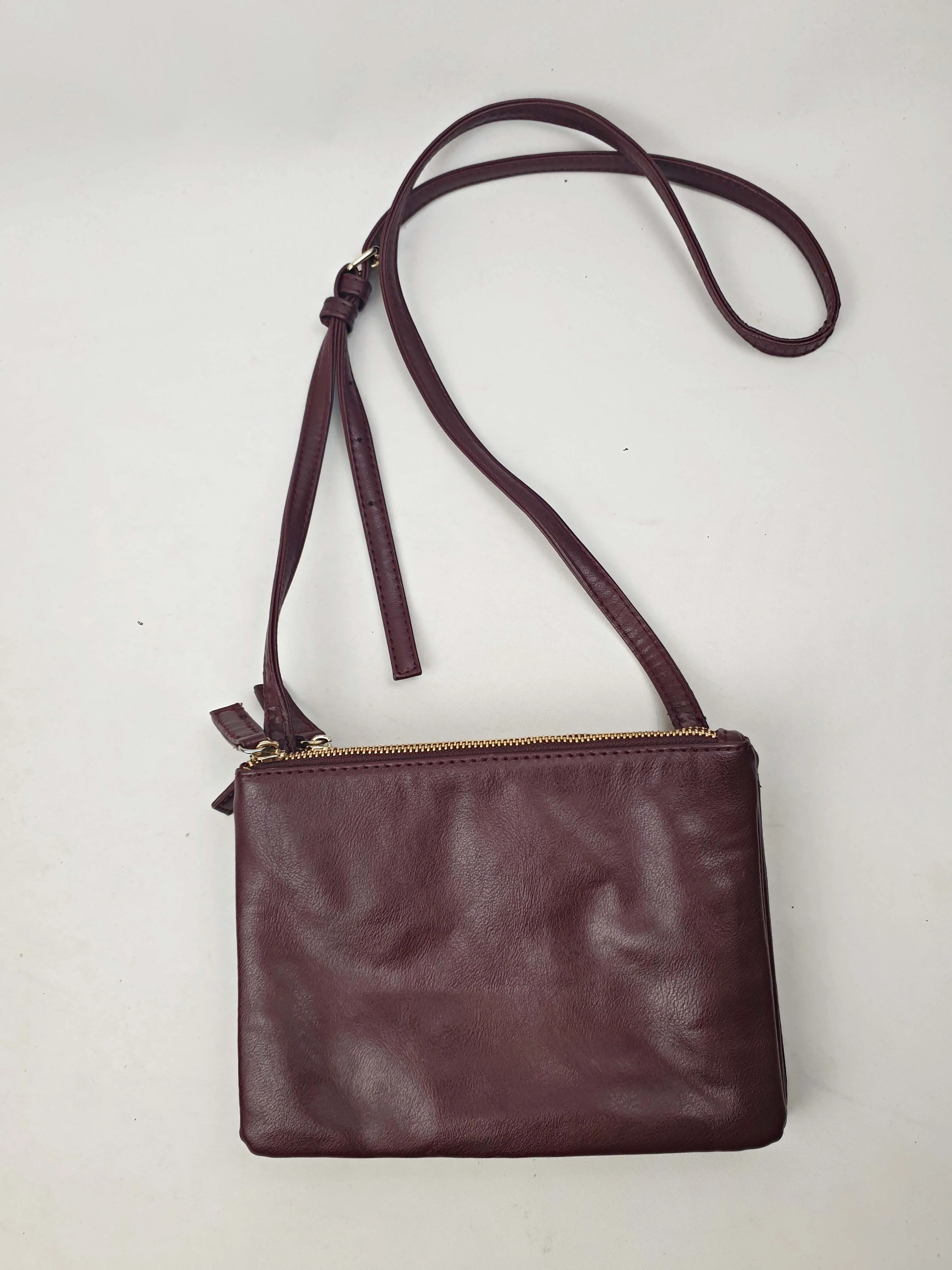 Magenta faux leather cross body bag