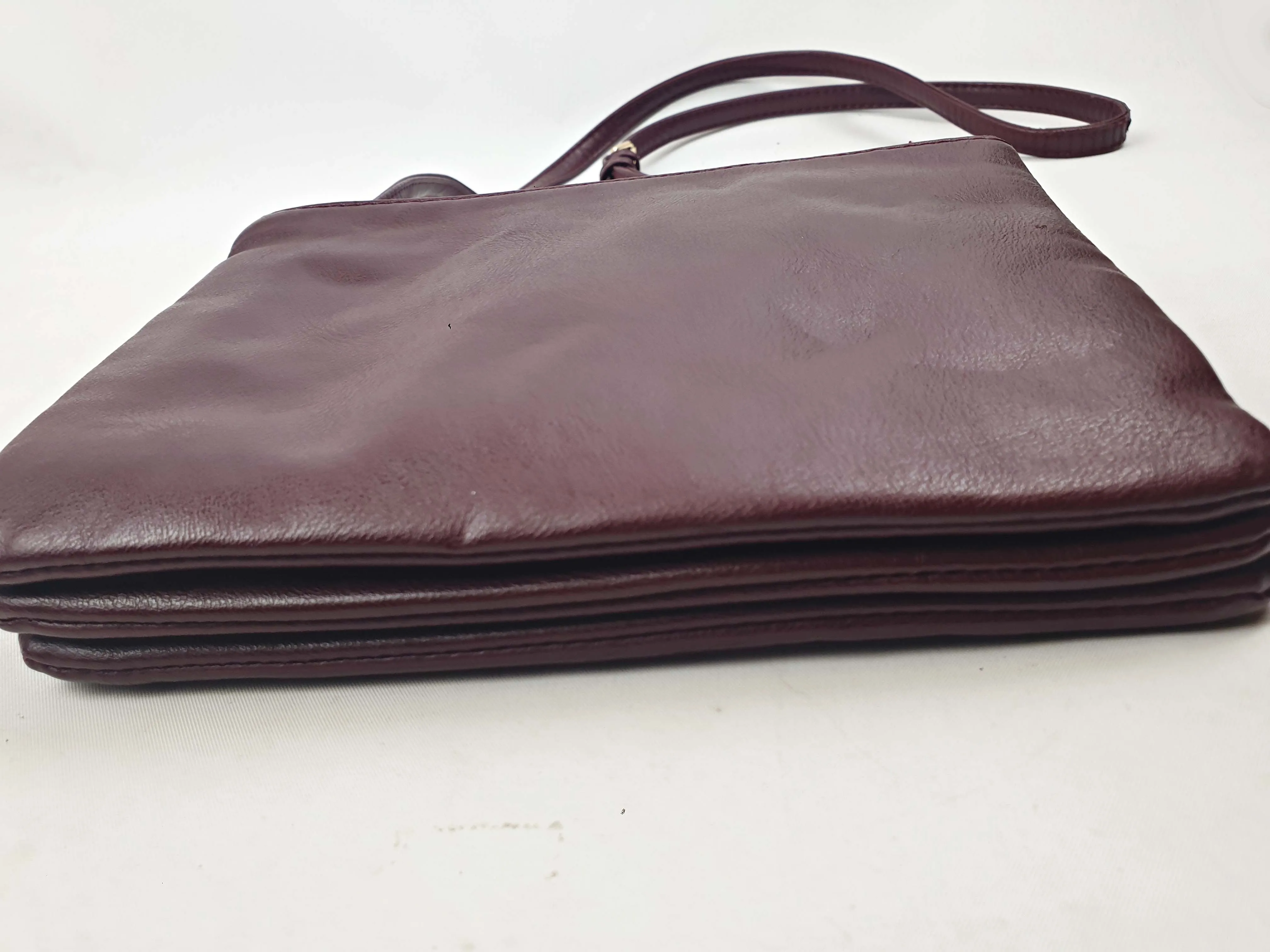 Magenta faux leather cross body bag