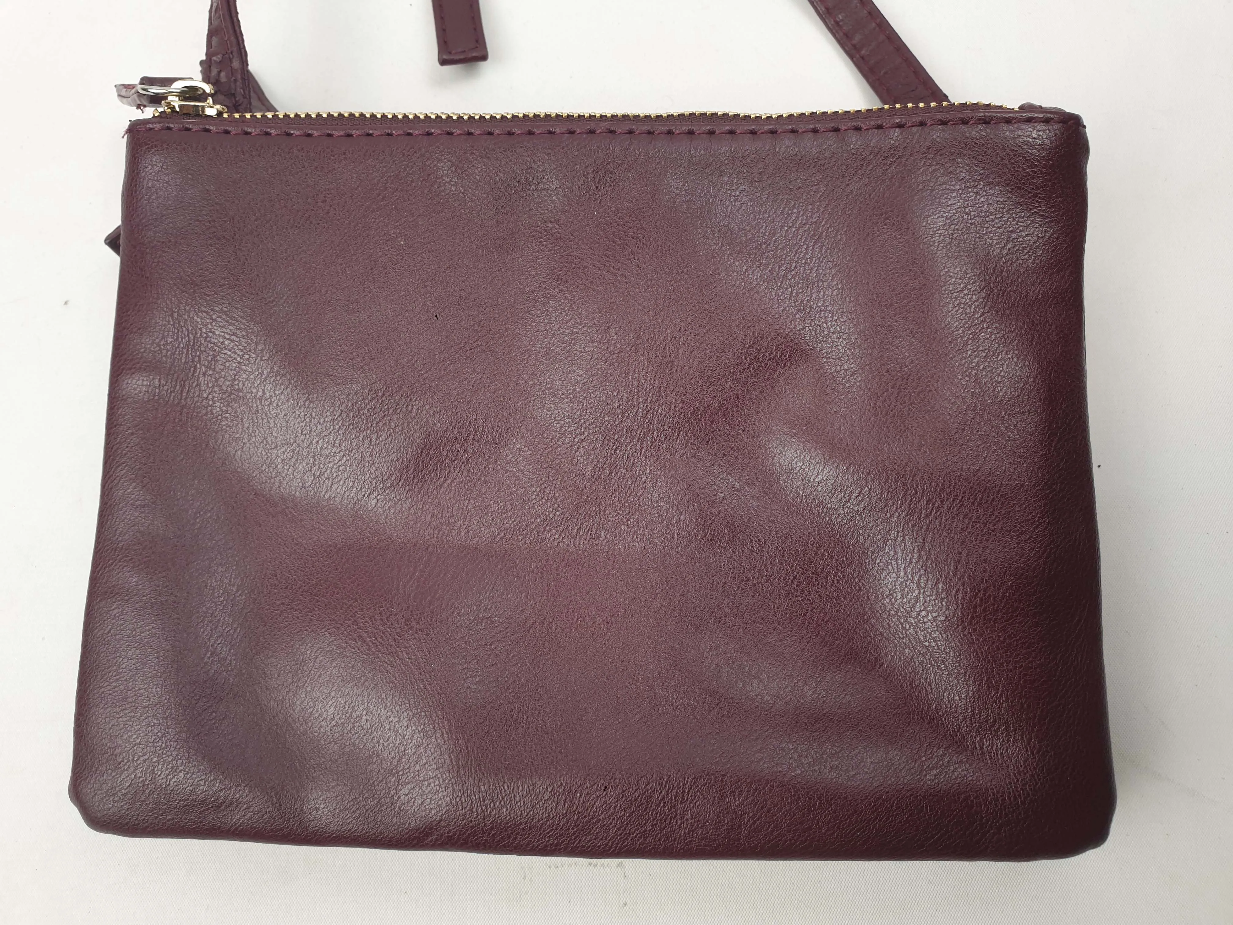 Magenta faux leather cross body bag