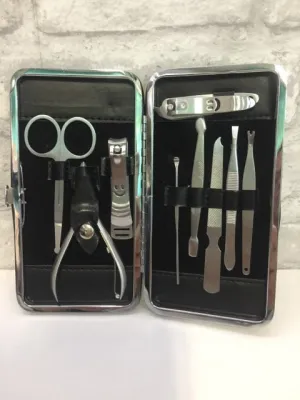 New 9 Piece Manicure set in black snap closure faux leather case!