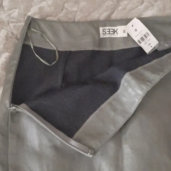 SEEK THE LABEL LF ASSYMETRICAL ZIP MINI SKIRT