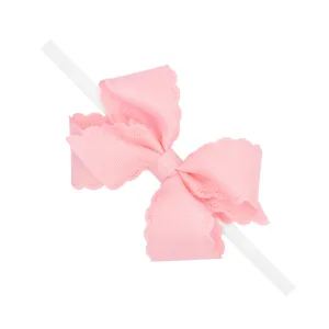 Small Grosgrain Hair Bow with Embossed Eyelet Edge on White Nylon Band