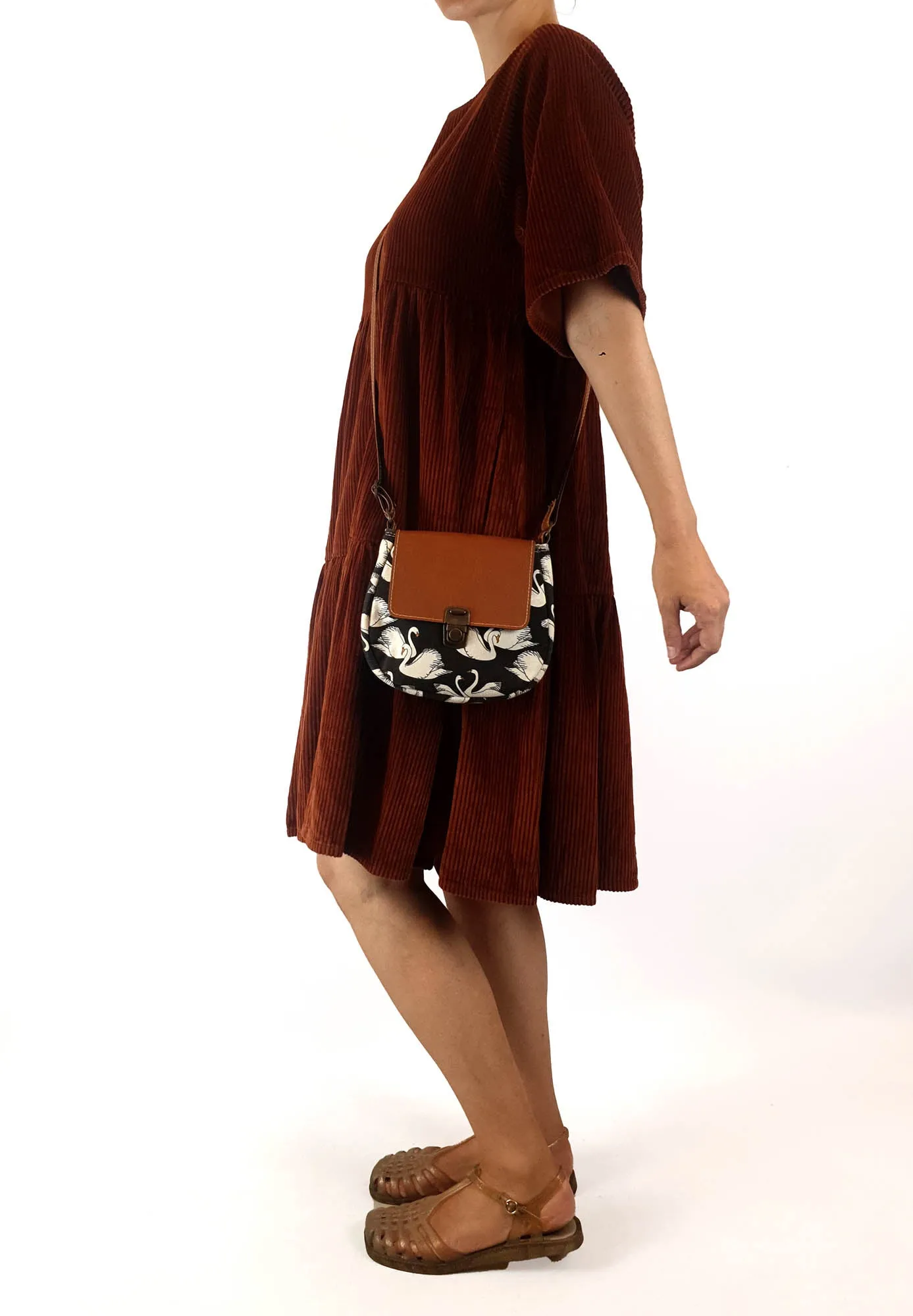 Swan print faux leather cross body bag
