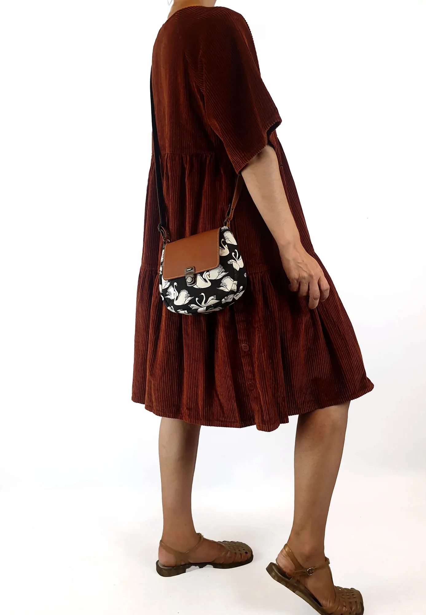 Swan print faux leather cross body bag