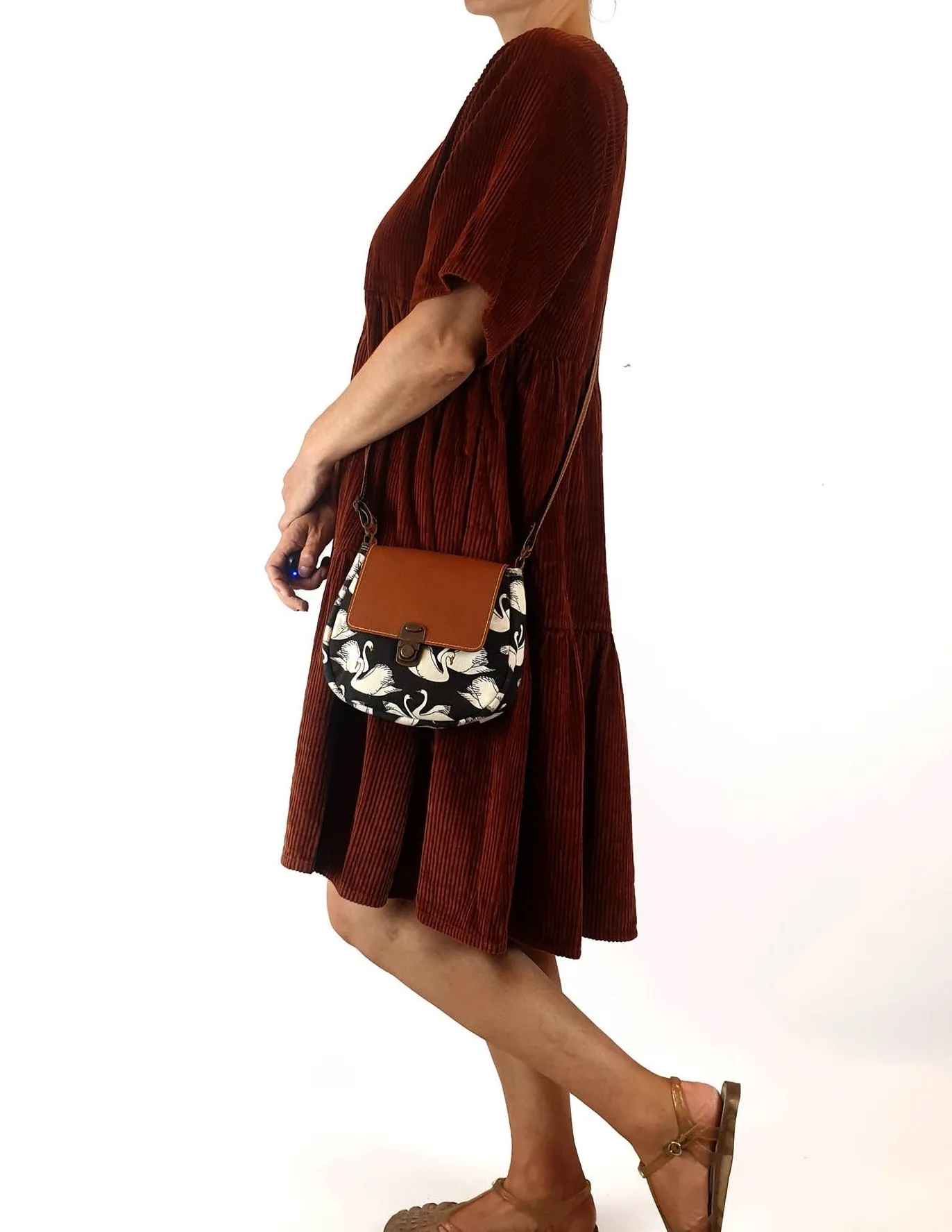 Swan print faux leather cross body bag