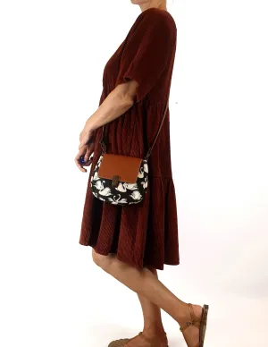 Swan print faux leather cross body bag