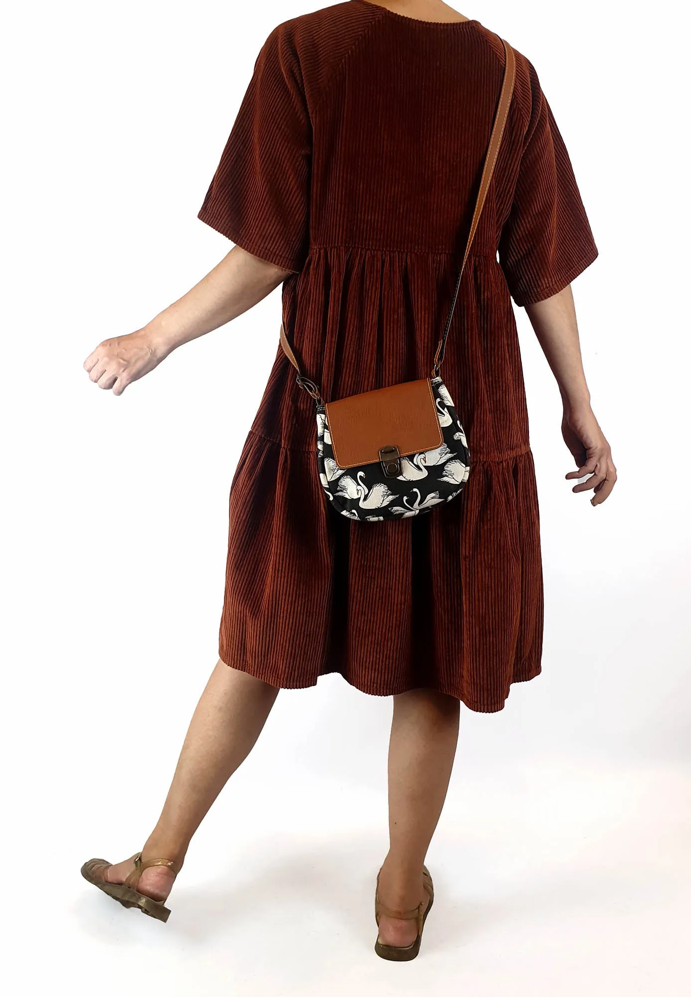 Swan print faux leather cross body bag