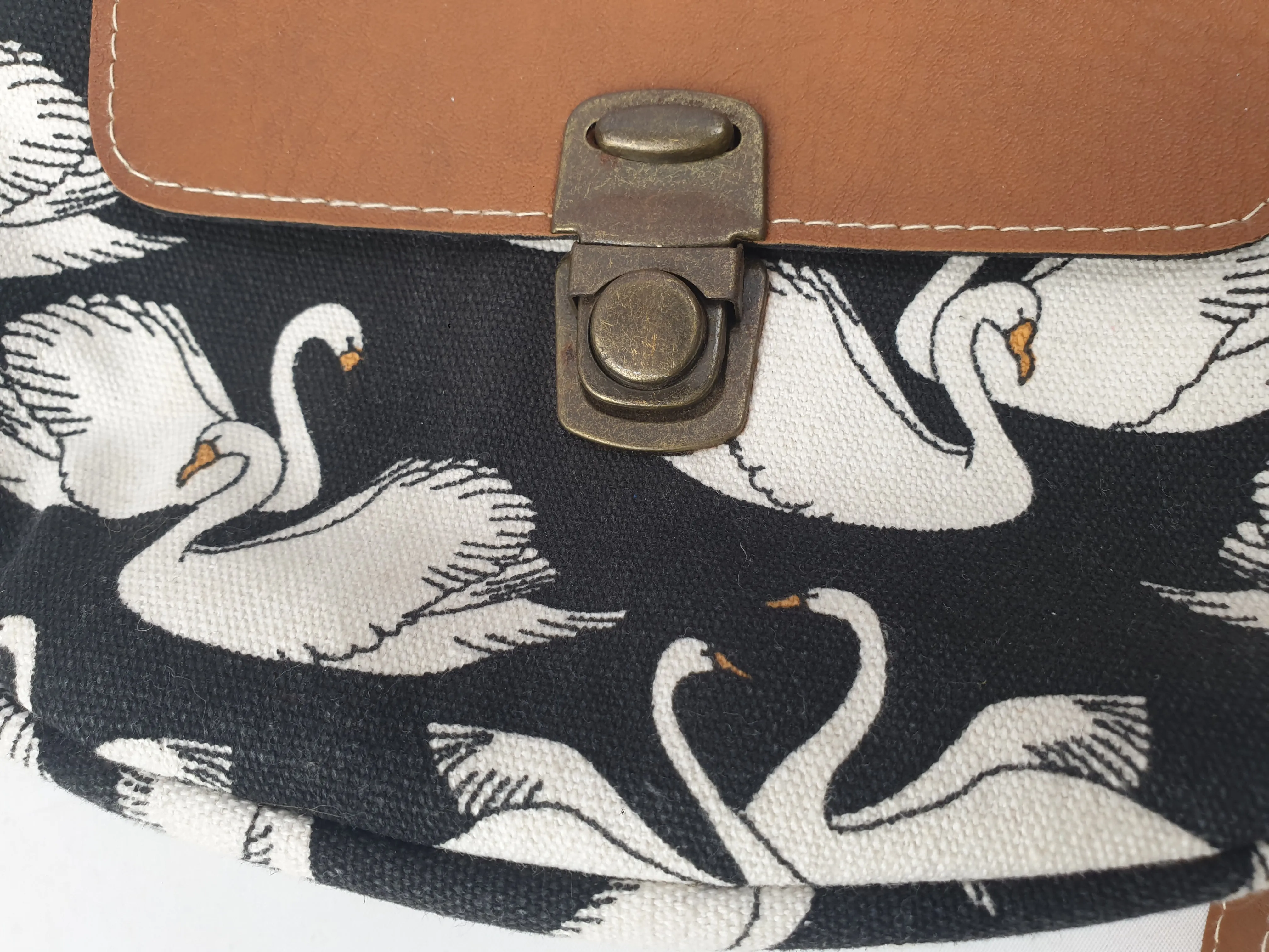 Swan print faux leather cross body bag