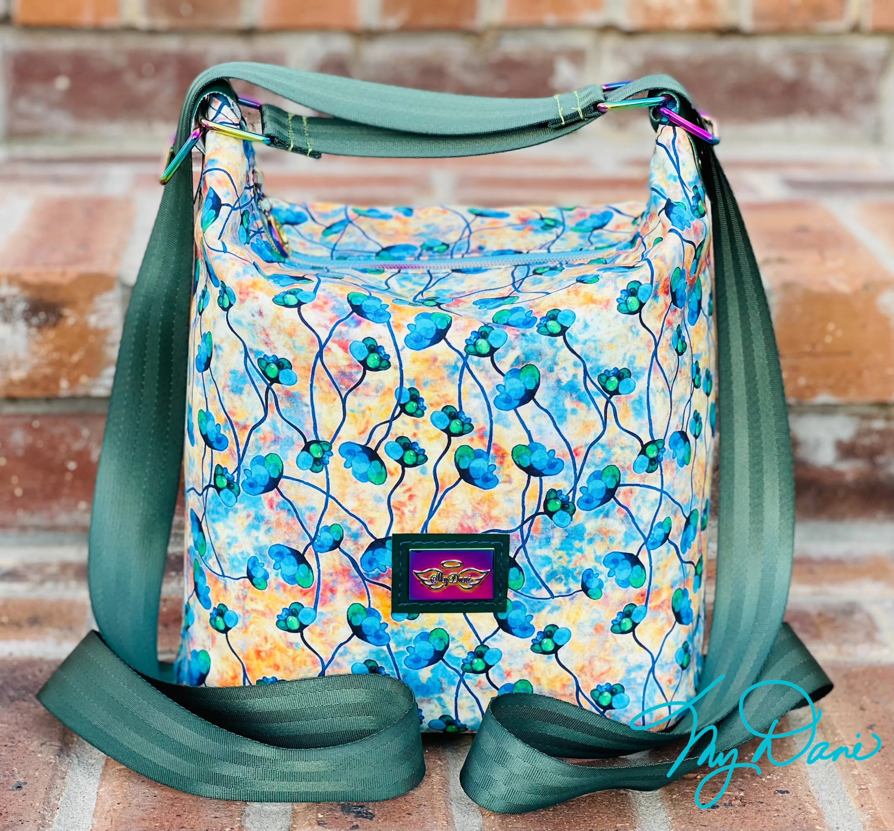 The Krystal Convertible Mini Handbag in Blue and Copper Floral